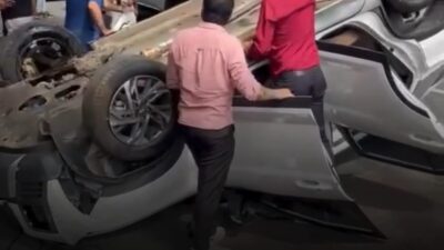 Carro capota na Cristóvão Colombo com Getúlio Vargas e trânsito complica na praça da Savassi